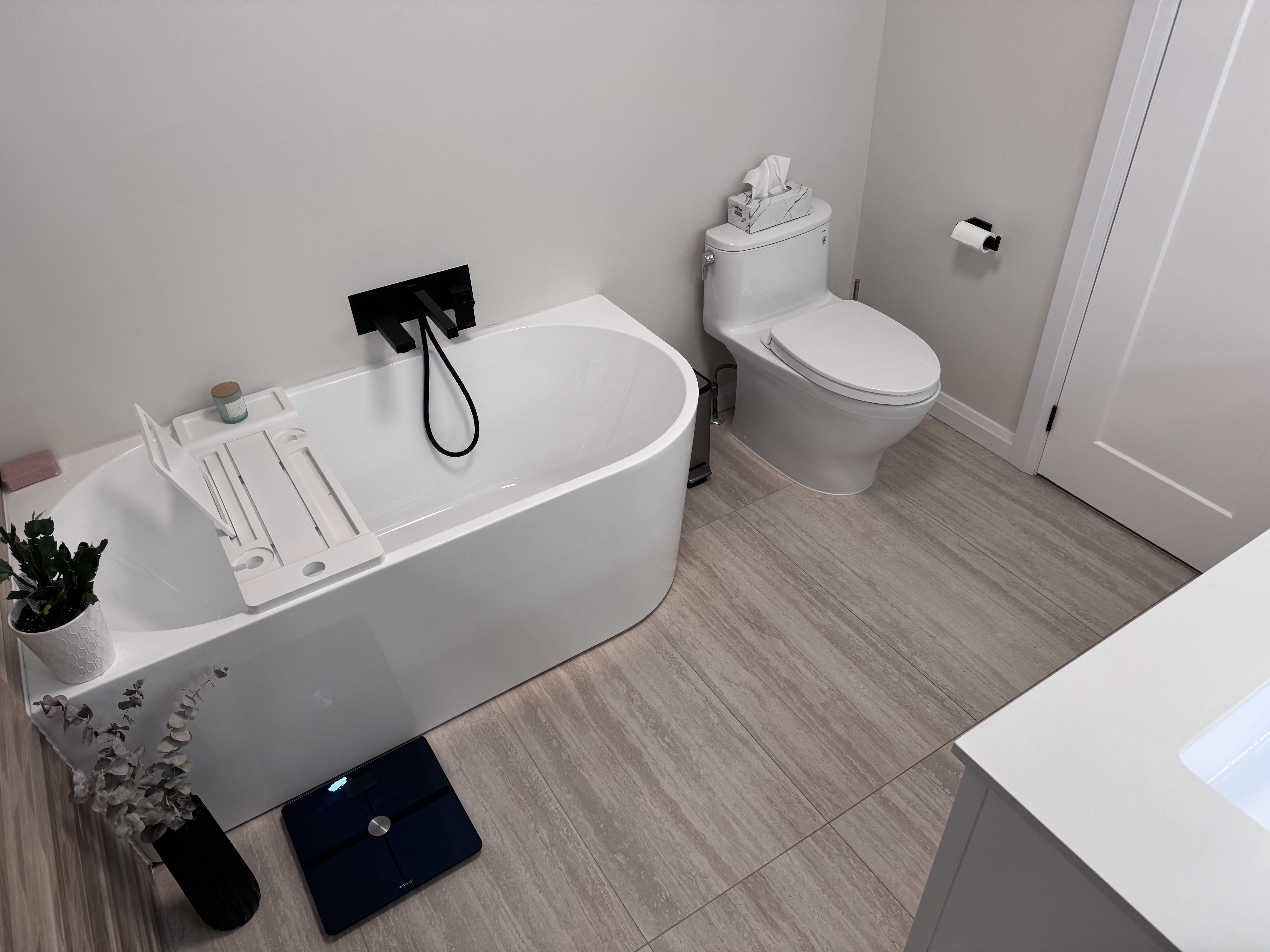 Bathroom with freestanding tub and spa finishes