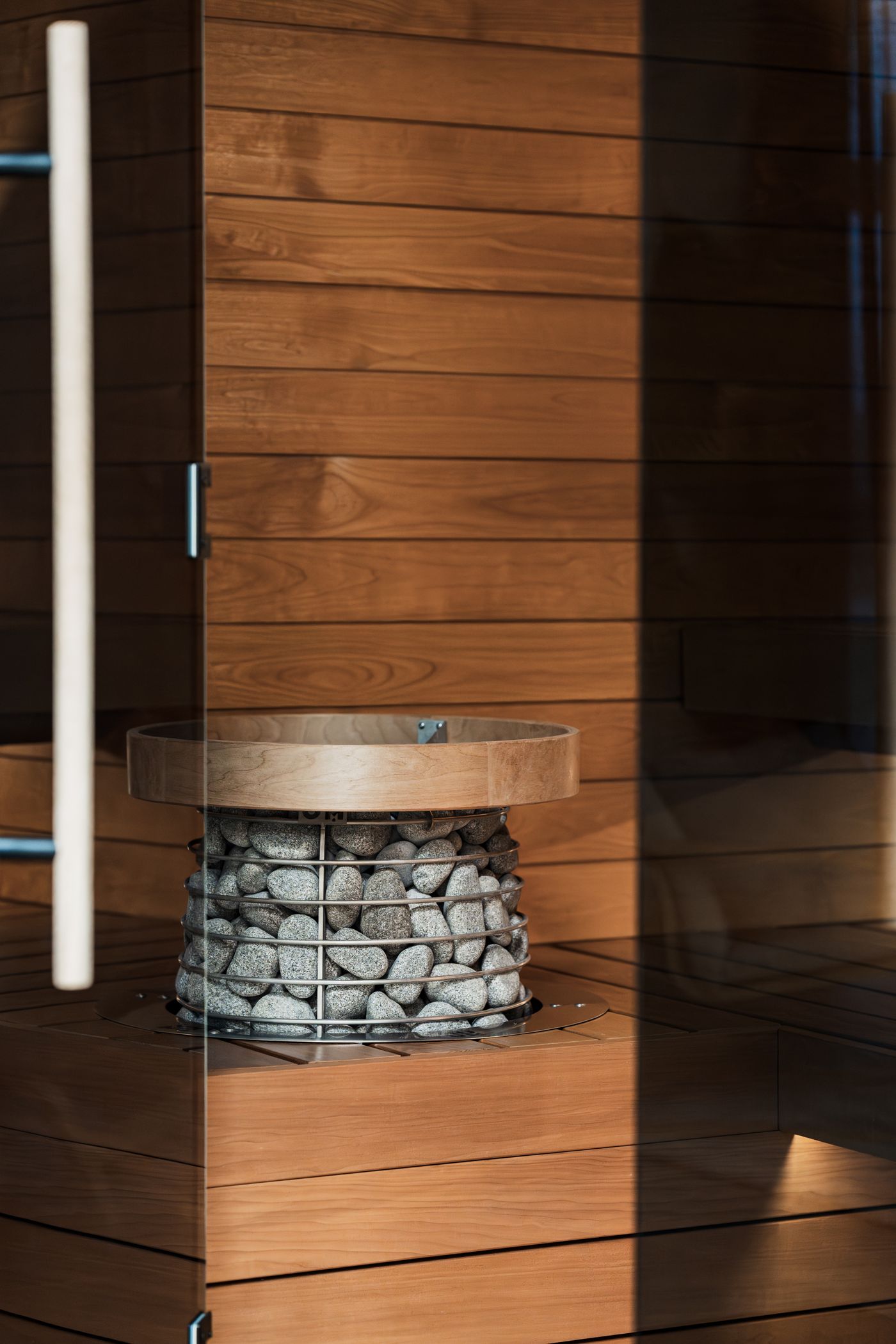 Custom cedar home sauna with stone heater built in Barrie